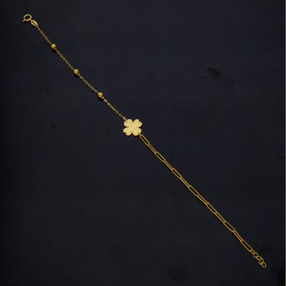 <tc>سوار ذهبي عيار ٢١ بتصميم ورقة برسيم – FKJBRL21KM12139</tc>